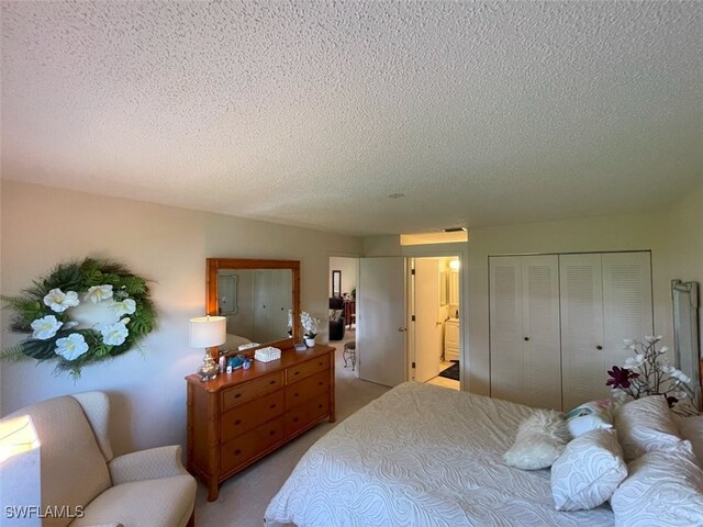 6300 S Pointe Blvd Unit 459, Fort Myers, FL 33919 - carpeted bedroom featuring a textured ceiling and a closet