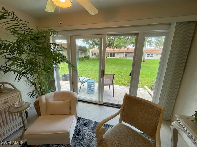 6300 S Pointe Blvd Unit 459, Fort Myers, FL 33919 - doorway featuring ceiling fan and light tile patterned floors