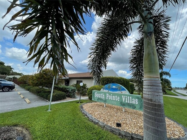 6300 S Pointe Blvd Unit 459, Fort Myers, FL 33919 - community / neighborhood sign featuring a yard