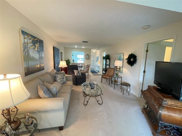 6300 S Pointe Blvd Unit 459, Fort Myers, FL 33919 - living area with light carpet and a textured ceiling