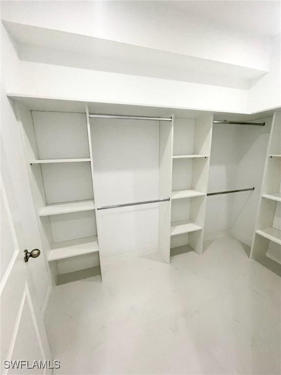 14121 Carlos St, Fort Myers, FL 33905 - spacious closet featuring light marble finish floors