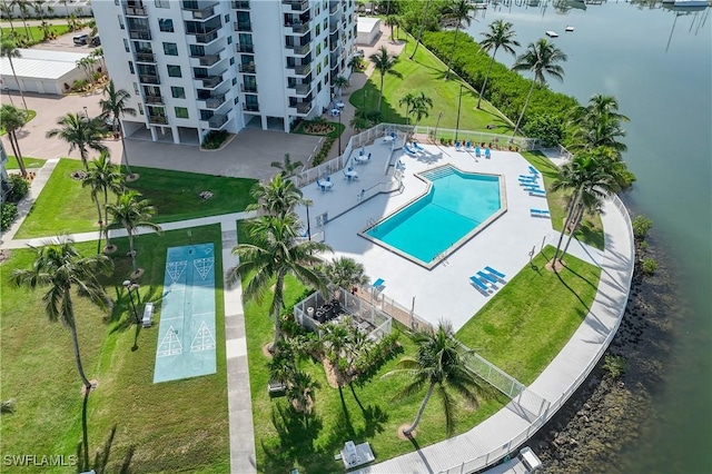 18068 San Carlos Blvd Unit 515, Fort Myers Beach, FL 33931 - drone / aerial view of a pool area and a large body of water