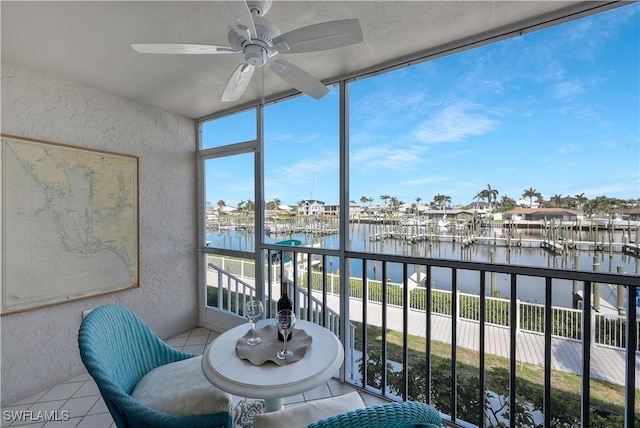 18068 San Carlos Blvd Unit 515, Fort Myers Beach, FL 33931 - sunroom / solarium with a textured wall, a water view, and tile patterned flooring