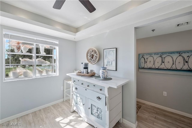 18068 San Carlos Blvd Unit 515, Fort Myers Beach, FL 33931 - detailed view of wood finished floors and ceiling fan