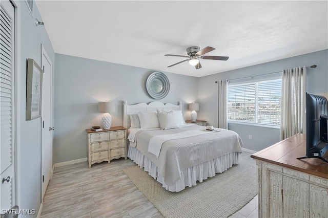 18068 San Carlos Blvd Unit 515, Fort Myers Beach, FL 33931 - bedroom with ceiling fan and light wood-style flooring