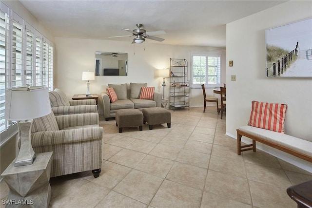 1721 Smugglers Cv, Naples, FL 34112 - living room with ceiling fan and light tile patterned floors