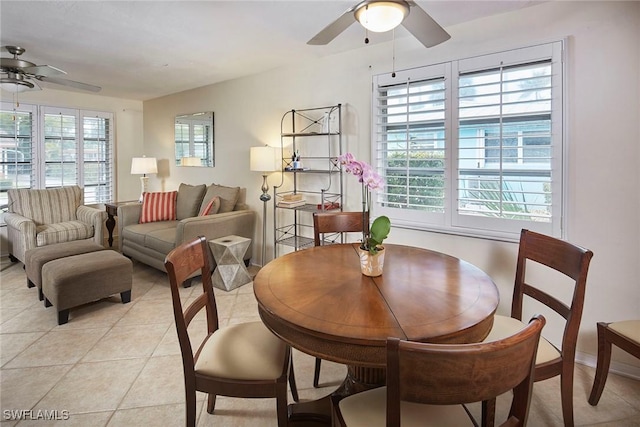 1721 Smugglers Cv, Naples, FL 34112 - dining area with a ceiling fan and light tile patterned floors