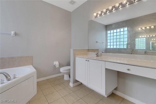 8677 Pegasus Dr, Lehigh Acres, FL 33971 - bathroom with vanity, tile patterned floors, and a bath