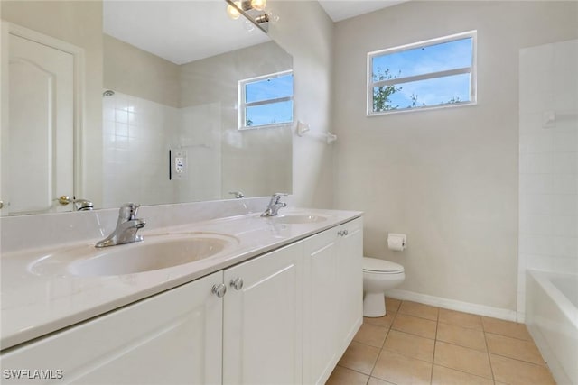 8677 Pegasus Dr, Lehigh Acres, FL 33971 - bathroom with double vanity, tile patterned floors, and tub / shower combination