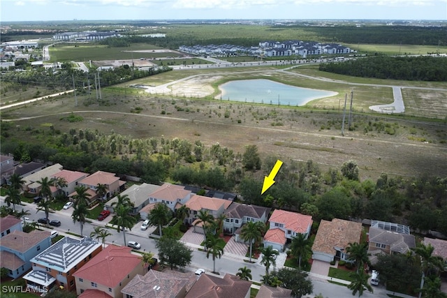 8677 Pegasus Dr, Lehigh Acres, FL 33971 - view of property location featuring nearby suburban area and a large body of water