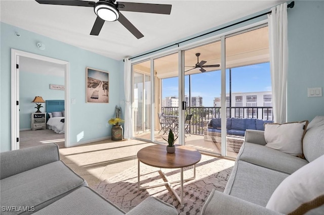 4411 Bay Beach Ln Unit 744, Fort Myers Beach, FL 33931 - living area featuring ceiling fan and expansive windows