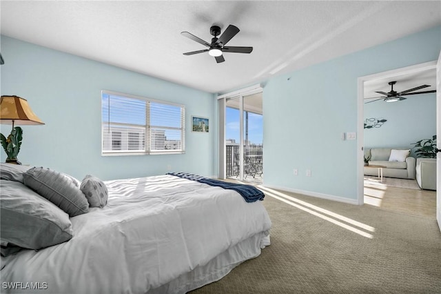 4411 Bay Beach Ln Unit 744, Fort Myers Beach, FL 33931 - bedroom featuring access to exterior, carpet floors, and a ceiling fan