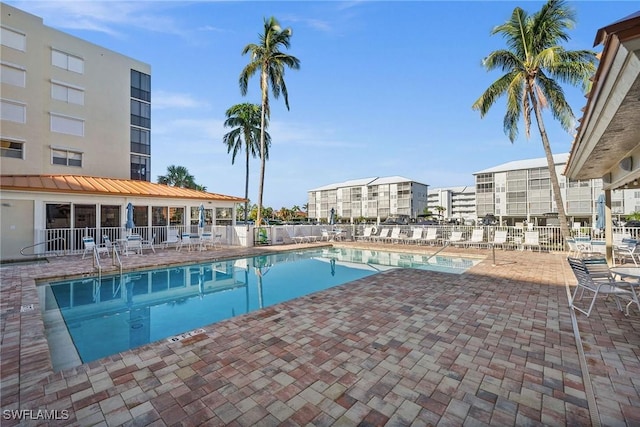 4411 Bay Beach Ln Unit 744, Fort Myers Beach, FL 33931 - community pool featuring a patio area