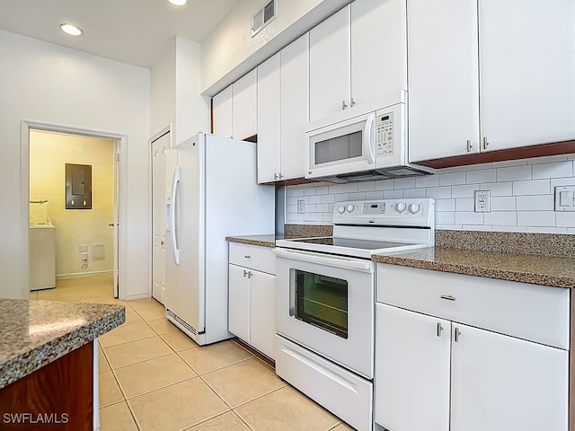 9260 Belleza Way Unit 203, Fort Myers, FL 33908 - kitchen featuring white appliances, electric panel, white cabinets, tasteful backsplash, and recessed lighting
