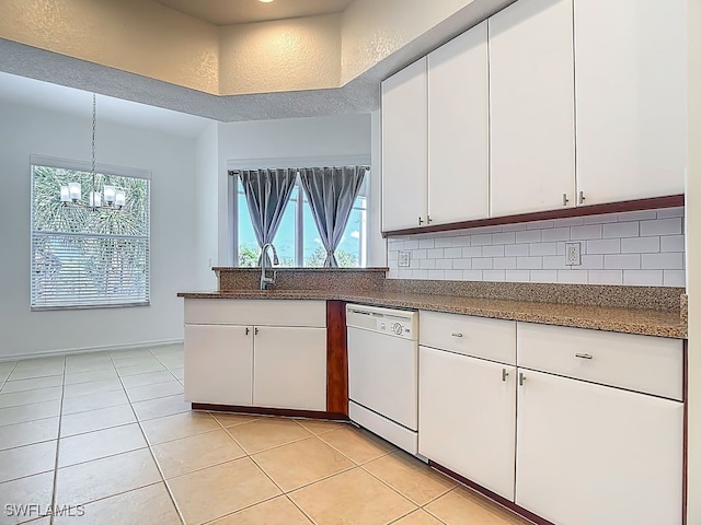 9260 Belleza Way Unit 203, Fort Myers, FL 33908 - kitchen featuring dishwasher, tasteful backsplash, light tile patterned floors, and white cabinets