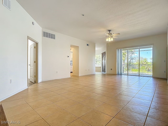 9260 Belleza Way Unit 203, Fort Myers, FL 33908 - spare room featuring ceiling fan and light tile patterned floors