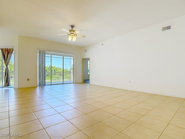 9260 Belleza Way Unit 203, Fort Myers, FL 33908 - unfurnished room with light tile patterned floors and ceiling fan