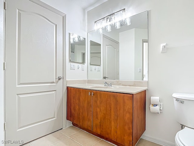 9260 Belleza Way Unit 203, Fort Myers, FL 33908 - bathroom with vanity and tile patterned flooring