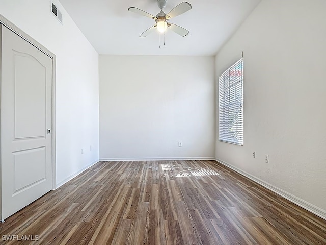 9260 Belleza Way Unit 203, Fort Myers, FL 33908 - unfurnished room with a ceiling fan and wood finished floors