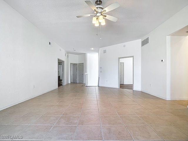 9260 Belleza Way Unit 203, Fort Myers, FL 33908 - spare room with light tile patterned floors and a ceiling fan