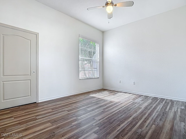 9260 Belleza Way Unit 203, Fort Myers, FL 33908 - empty room featuring wood finished floors and ceiling fan