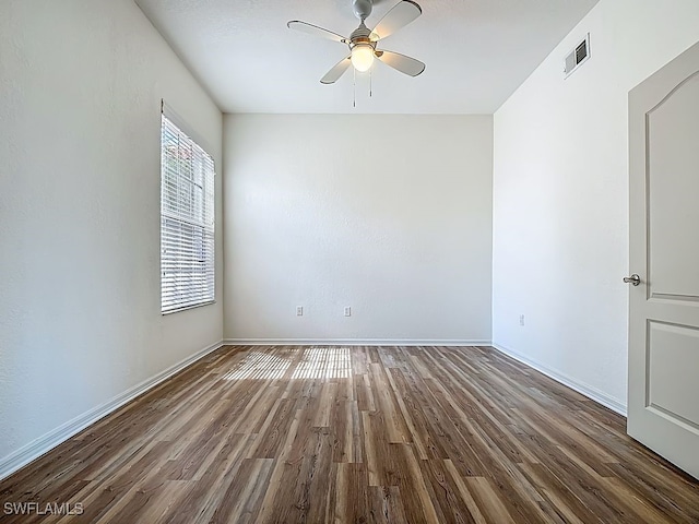 9260 Belleza Way Unit 203, Fort Myers, FL 33908 - spare room with wood finished floors and a ceiling fan