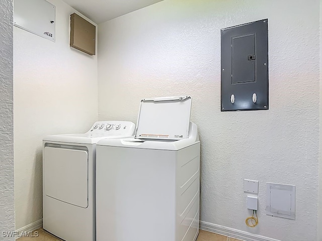9260 Belleza Way Unit 203, Fort Myers, FL 33908 - laundry area with electric panel and washing machine and dryer