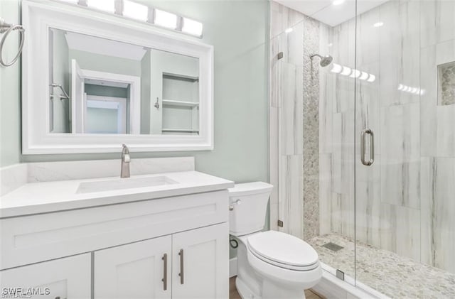 407 Meadowlark Ln Unit 407B, Naples, FL 34105 - bathroom featuring vanity and a shower stall