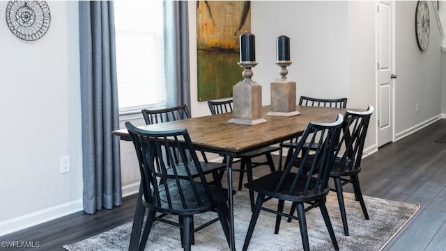 17573 Monte Isola Way N, Fort Myers, FL 33917 - dining space with dark wood finished floors and baseboards