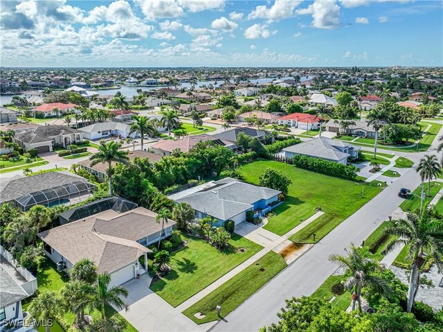 211 W Flamingo Cir, Marco Island, FL 34145 - aerial perspective of suburban area featuring a nearby body of water
