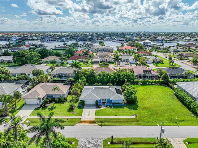 211 W Flamingo Cir, Marco Island, FL 34145 - aerial perspective of suburban area with a large body of water