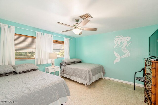 211 W Flamingo Cir, Marco Island, FL 34145 - bedroom featuring speckled floor and a ceiling fan