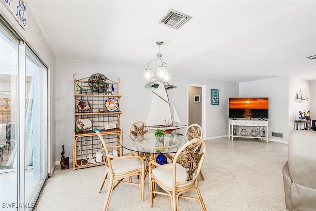 211 W Flamingo Cir, Marco Island, FL 34145 - dining area featuring speckled floor and baseboards