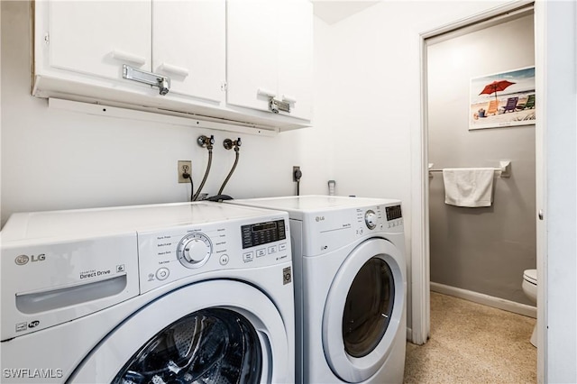 211 W Flamingo Cir, Marco Island, FL 34145 - laundry room featuring washing machine and clothes dryer and cabinet space