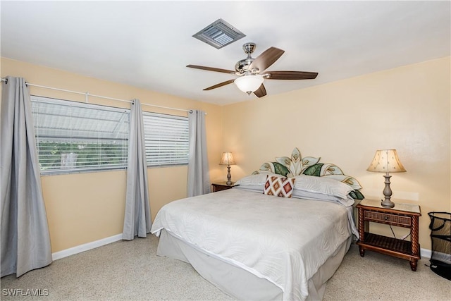 211 W Flamingo Cir, Marco Island, FL 34145 - bedroom with a ceiling fan and dark aggregate flooring