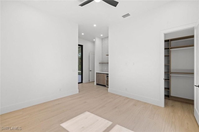 3620 SW 4th Ln, Cape Coral, FL 33991 - unfurnished living room featuring light wood finished floors, a ceiling fan, and recessed lighting