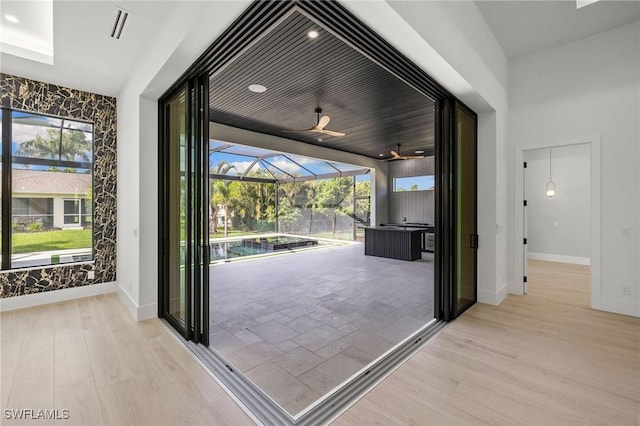 3620 SW 4th Ln, Cape Coral, FL 33991 - entryway with a sunroom and wood finished floors