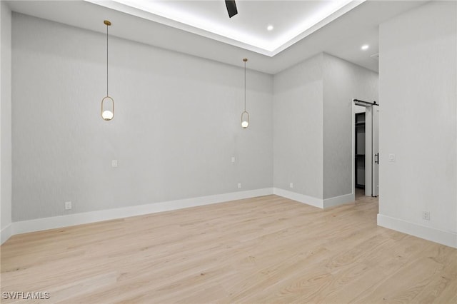 3620 SW 4th Ln, Cape Coral, FL 33991 - spare room featuring light wood-type flooring, a ceiling fan, and recessed lighting
