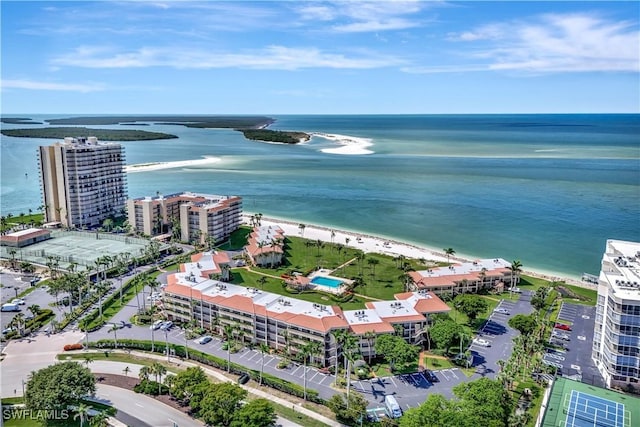 1080 S Collier Blvd Unit 305, Marco Island, FL 34145 - drone / aerial view of a nearby body of water and apartment complex