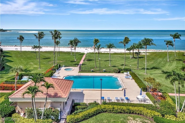 1080 S Collier Blvd Unit 305, Marco Island, FL 34145 - community pool with a water view, a patio, and a community hot tub