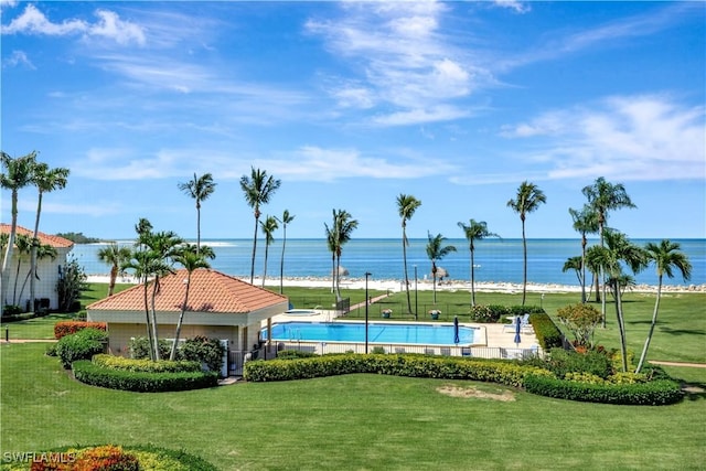 1080 S Collier Blvd Unit 305, Marco Island, FL 34145 - community pool with a water view and a lawn