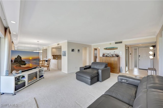 1080 S Collier Blvd Unit 305, Marco Island, FL 34145 - living room with light carpet, crown molding, and recessed lighting