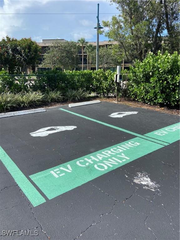 1080 S Collier Blvd Unit 305, Marco Island, FL 34145 - view of uncovered parking lot