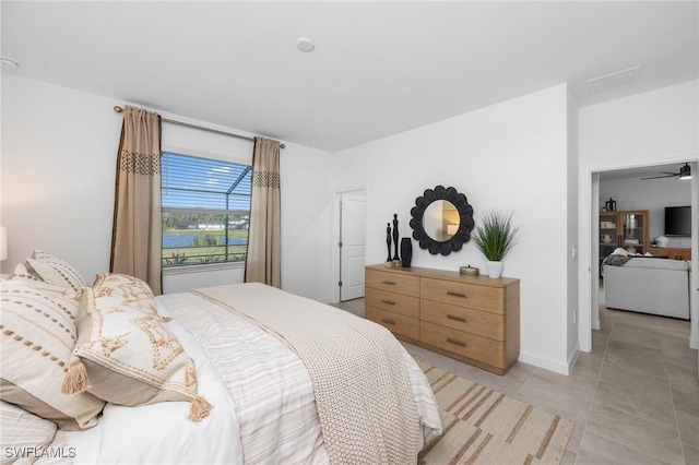 17752 Saddleback Loop, North Fort Myers, FL 33917 - bedroom with a water view and light tile patterned flooring