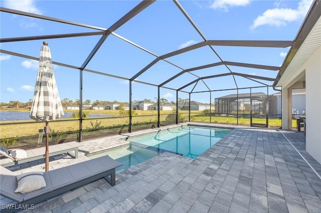 17752 Saddleback Loop, North Fort Myers, FL 33917 - view of swimming pool with a patio, a water view, a pool with connected hot tub, a residential view, and glass enclosure