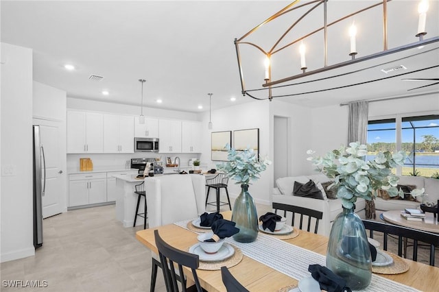 17752 Saddleback Loop, North Fort Myers, FL 33917 - dining area with recessed lighting and baseboards