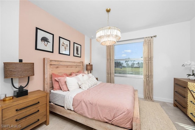 17752 Saddleback Loop, North Fort Myers, FL 33917 - bedroom featuring a chandelier and light tile patterned flooring