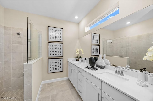 17752 Saddleback Loop, North Fort Myers, FL 33917 - bathroom featuring double vanity, walk in shower, tile patterned floors, and recessed lighting