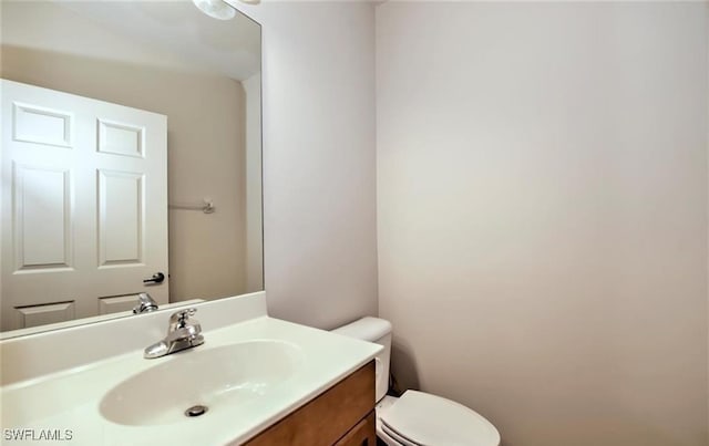20250 Burnside Pl Unit 1502, Estero, FL 33928 - bathroom featuring vanity and toilet
