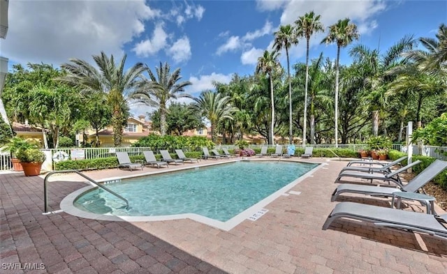 20250 Burnside Pl Unit 1502, Estero, FL 33928 - community pool featuring a patio area